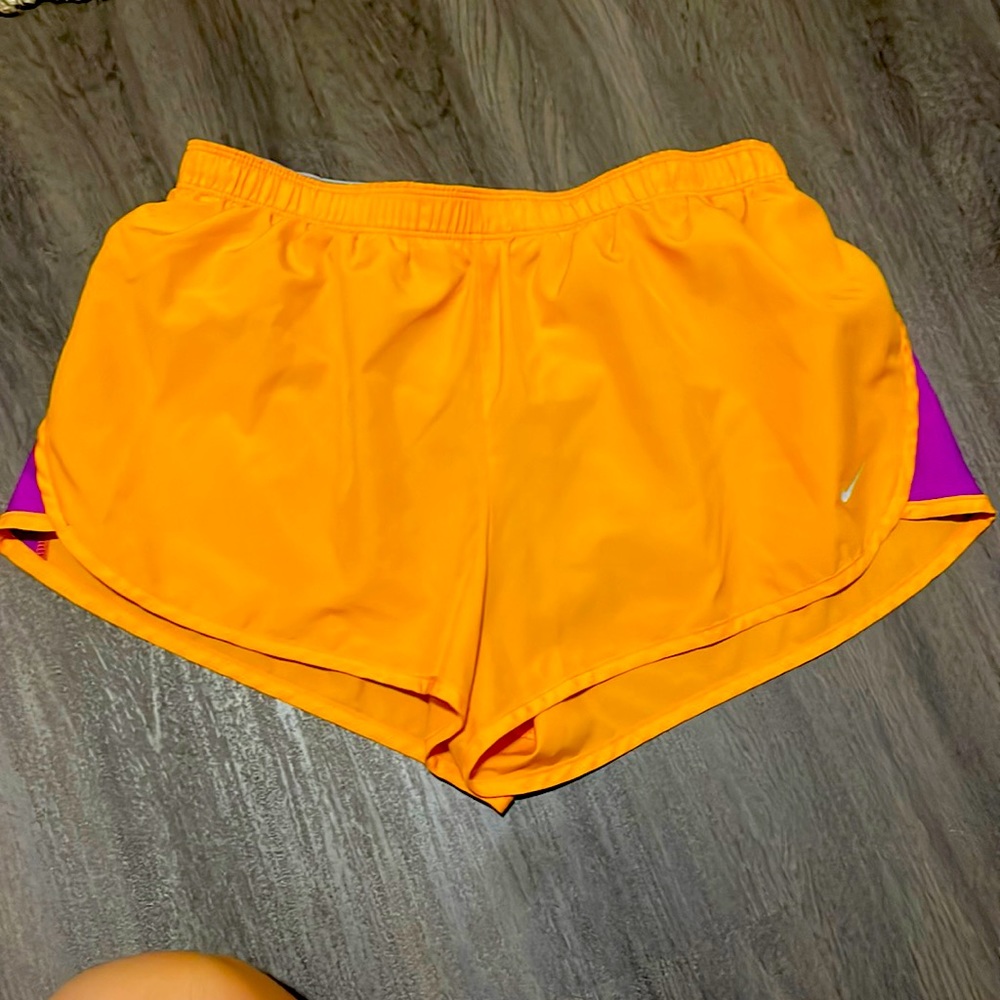 Super Cute, Super Comfy Orange Nike Tempos with Purple Accent Strips